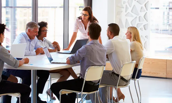 bigstock-businesswoman-presenting-to-co-90005582.jpg